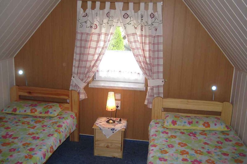 1. Slaapkamer met 2 éénpersoonsbedden