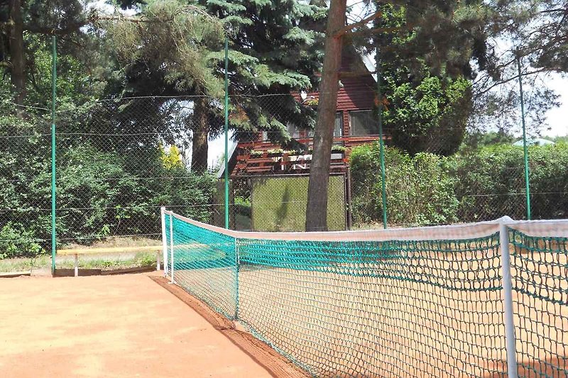 Tennisplaats voor het huis