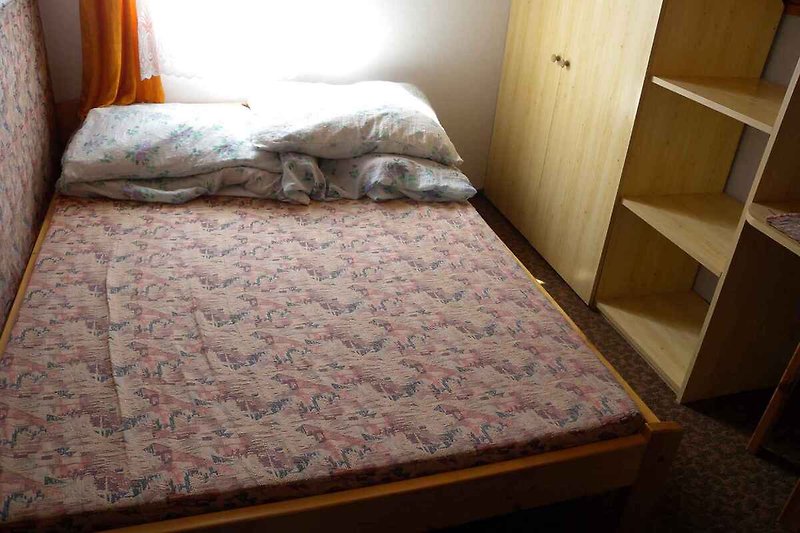 Slaapkamer in het kleine huis