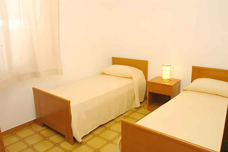 Camera da letto con 2 letti singoli (esempio)