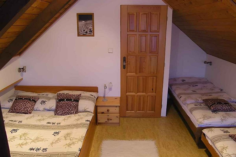 Pokój z 4 łóżkami na poddaszu