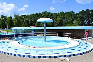 Ferienhaus mit Terrasse, Sandkasten und