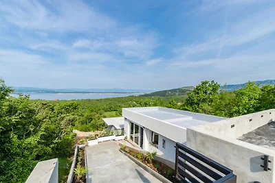 Ferienhaus mit Pool und Meerblick