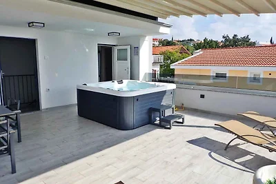 Ferienhaus mit Pool und Meerblick