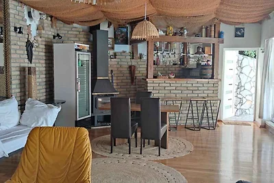 Ferienwohnung mit Poolnutzung und Meerblick