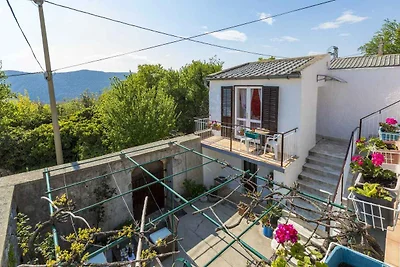 Ferienhaus mit Balkon und Klimaanlage