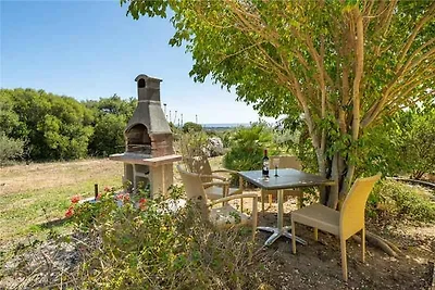 Ferienhaus mit Garten und Klimaanlage