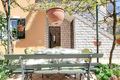 Ferienwohnung mit Terrasse 100 m vom Strand