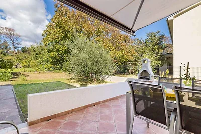 Ferienwohnung mit Garten und Klimaanlage