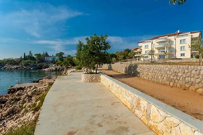 Ferienwohnung mit Pool und Meerblick