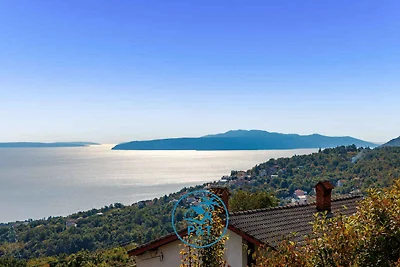 Ferienhaus mit Pool und Meerblick