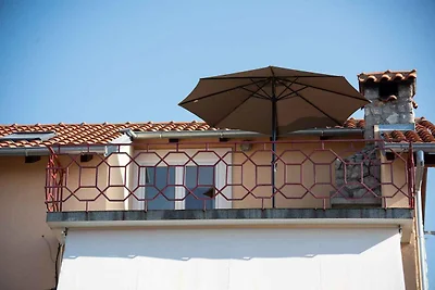 Ferienwohnung mit Swimmingpool und Meerblick