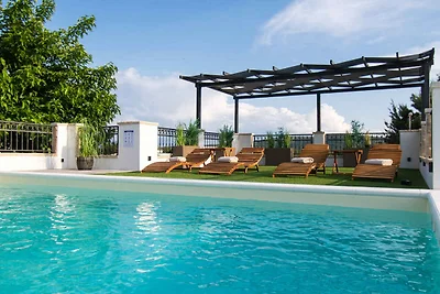 Ferienhaus mit Klimaanlage und Aussenpool