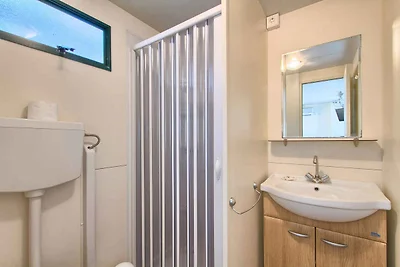 Mobilehome mit schöner, halb überdachter