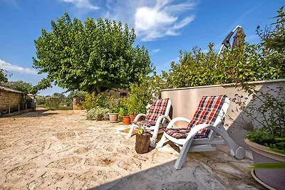Ferienhaus mit privatem Garten und Grill für 
