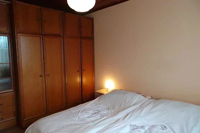 Ferienhaus mit Balkon und Klimaanlage