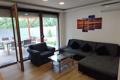 Ferienhaus mit Whirlpool, Klimaanlage und