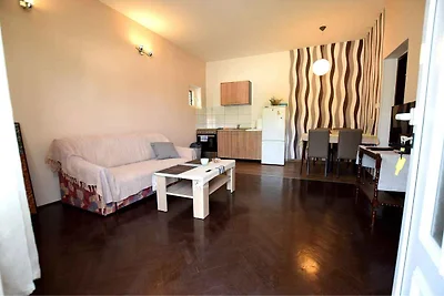 Ferienwohnung mit möbiliertem Balkon