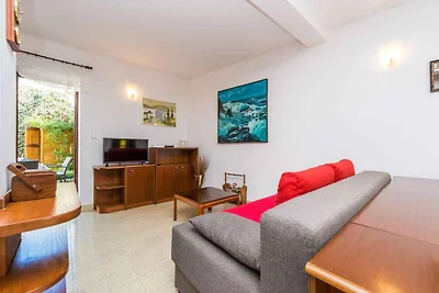 Ferienhaus mit Garten und Klimaanlage