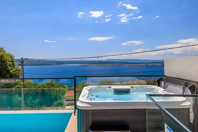 Ferienhaus mit Pool und Meerblick