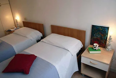 Ferienwohnung mit Balkon, 150 m vom Strand