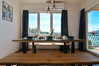 Ferienwohnung am Meer mit einem Balkon