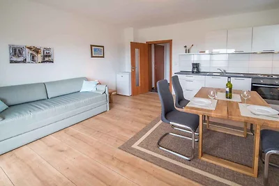 Ferienwohnung mit Balkon und Blick aufs Meer