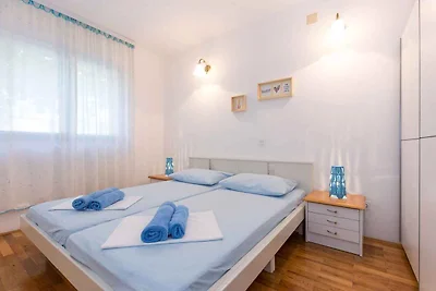 Ferienwohnung mit einer überdachten Terrasse