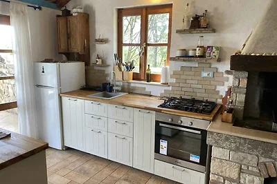 Ferienhaus mit Garten und Meerblick