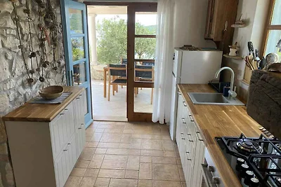 Ferienhaus mit Garten und Meerblick