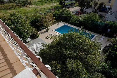 Ferienwohnung mit Pool und Meerblick
