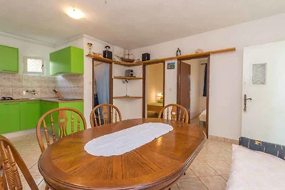 Ferienhaus mit Garten und Meerblick