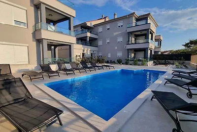 Ferienwohnung mit Swimmingpool und Meerblick