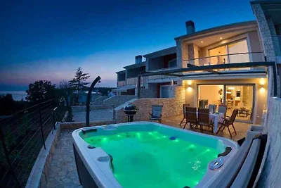Ferienhaus mit Whirlpool und Meerblick in