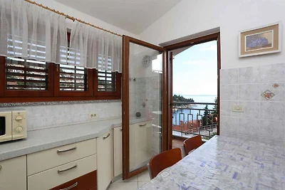 Ferienwohnung mit einen Balkon und Meerblick