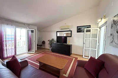 Ferienwohnung mit Pool und Meerblick