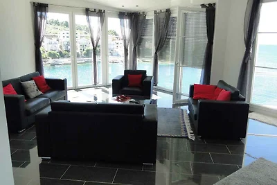 Ferienwohnung mit Poolnutzung und Meerblick