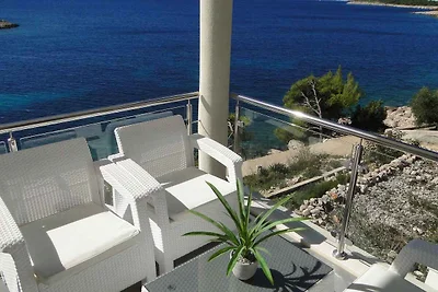 Ferienwohnung mit Poolnutzung und Meerblick