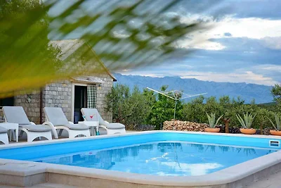 Ferienhaus mit Pool und Klimaanleg