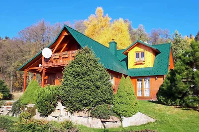 Ferienhaus mit Kamin und Sauna bei Wald