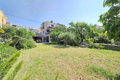 Ferienwohnung mit Garten und Klimaanlage