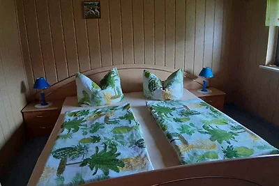 Ferienhaus mit Kinderschaukel und