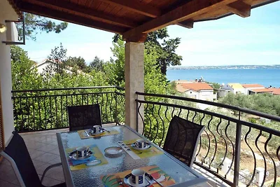 Ferienhaus mit Balkon