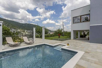 Ferienhaus mit Terrasse und Pool und