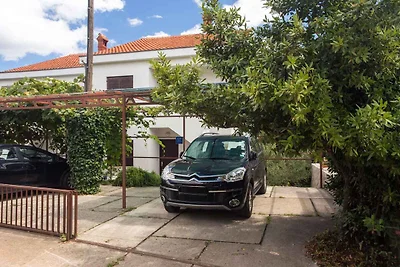 Ferienwohnung mit einer überdachten Terrasse