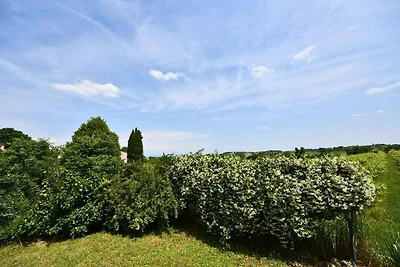 Ferienhaus mit Garten und Klimaanlage