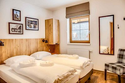 Chalet mit Hallenbad, Wellness und Kinderspie