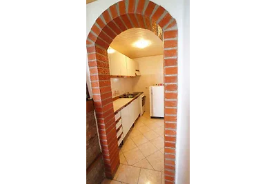 Ferienhaus mit Balkon und Garten