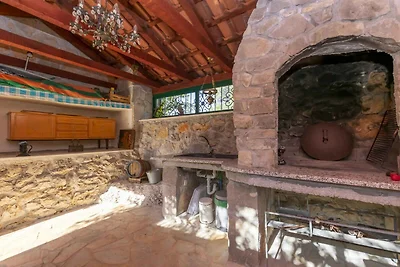Ferienhaus mit Garten und Klimaanlage