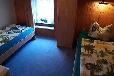 Ferienhaus mit Kinderschaukel und